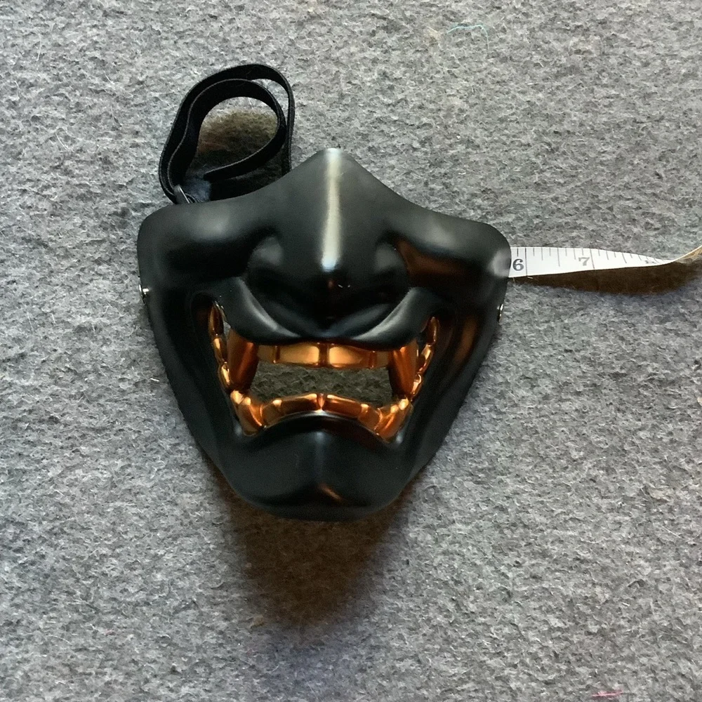 Black and Gold Mask with adjustable strap